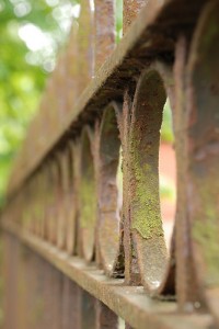 A rusty gate blurs out of focus